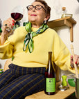 Dinner Party Pack Graza Olive Oil Woman Drinking Red Wine While Cooking