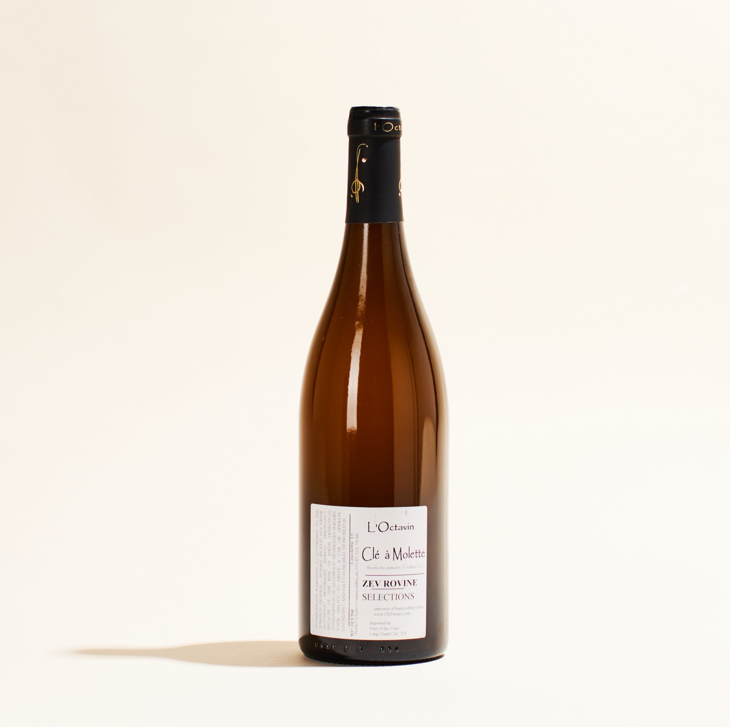 natural white wine bottle cle a molette domaine de l octavin jura france